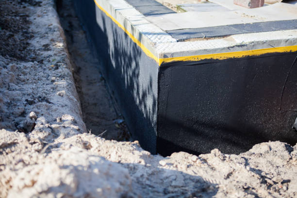 Professional Waterproofing technician working in Frankfort, KY